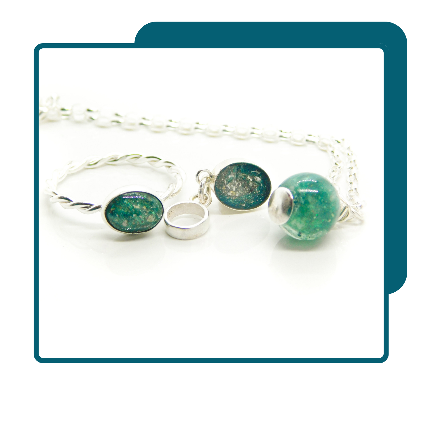 Handcrafted memorial ashes ring, dangle charm and necklace at Elessora