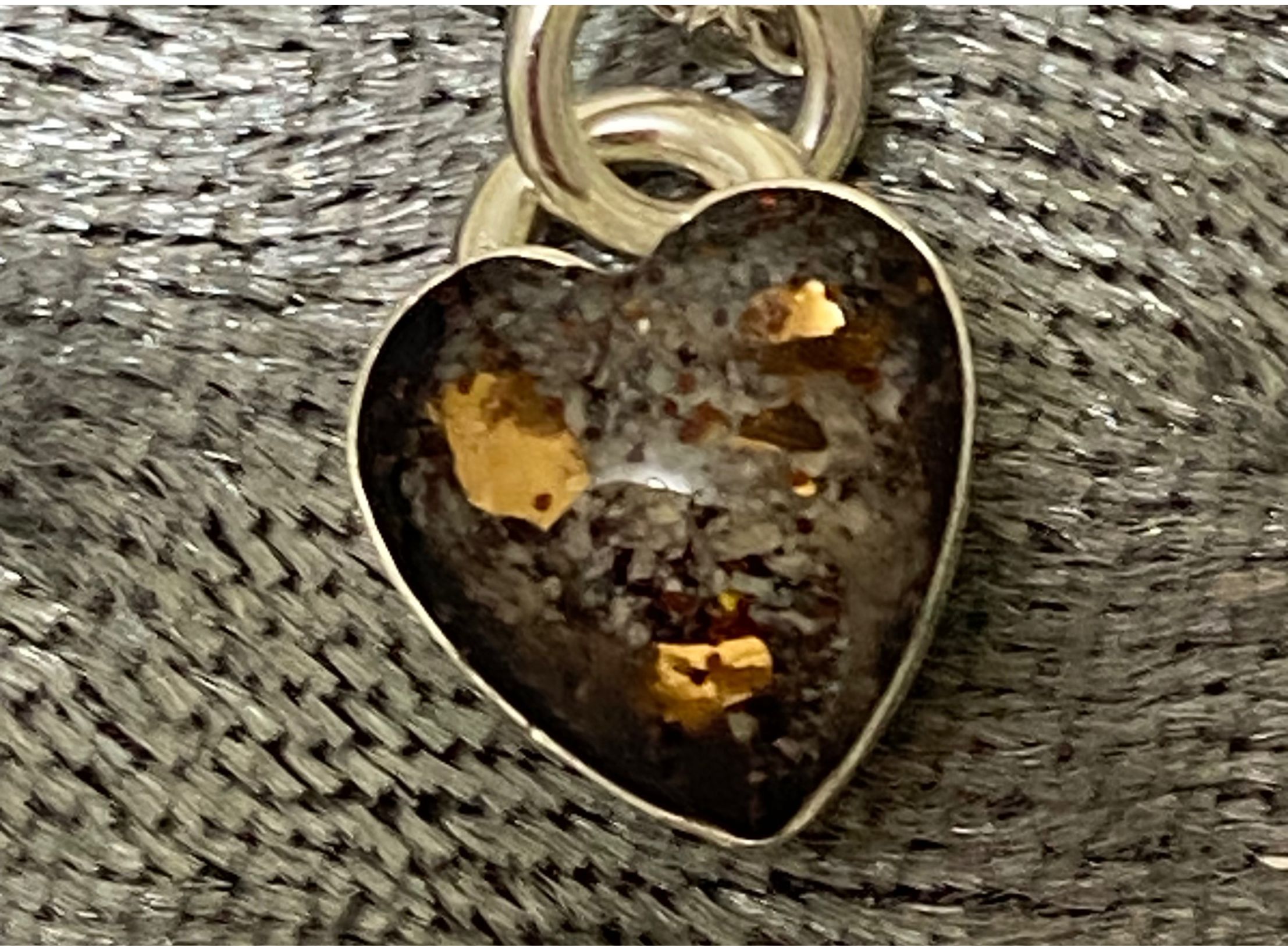 Heart-shaped charm memorial ashes